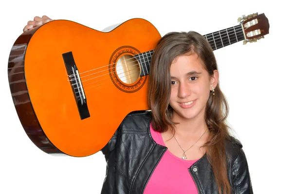 Trendy hispanic teenage girl carrying a guitar — Stock Photo, Image