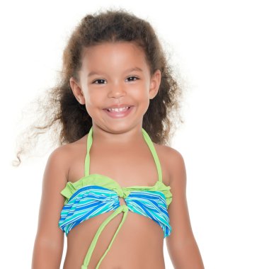 Cute small hispanic girl wearing a swimsuit