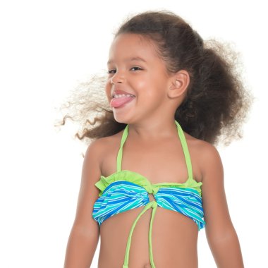 Cute small hispanic girl wearing a swimsuit