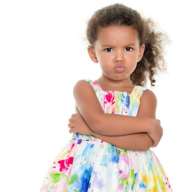 Cute small girl making a funny angry face clipart