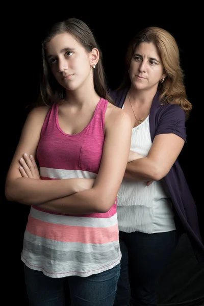 Angry mother with her teen daughter ignoring her — Stock Photo, Image