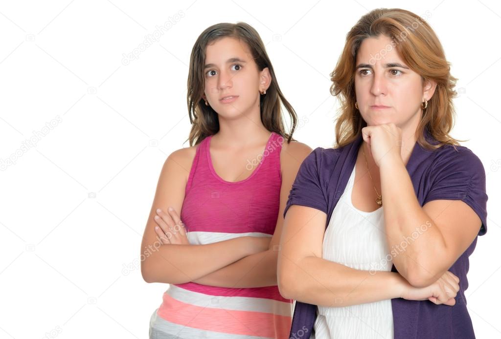 Mother and her teenage daughter sad and angry at each other