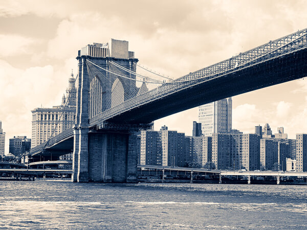 Split toned vintage image of the Brooklyn Bridge in New York