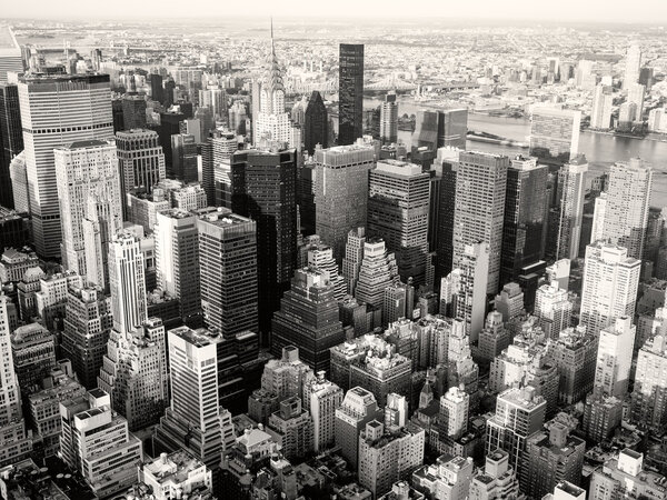 Black and white view of New York City including the Chrysler Building and the United Nations