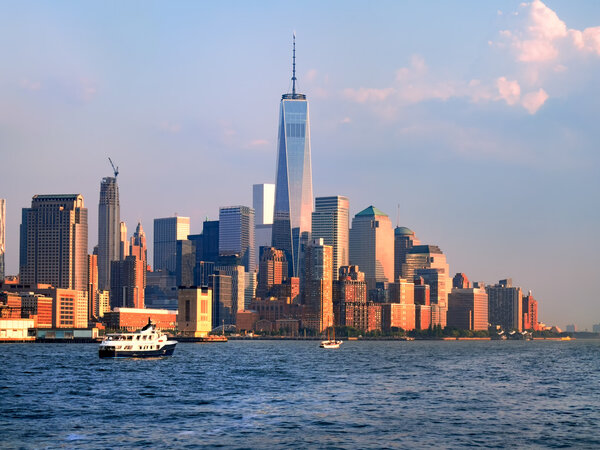 The downtown Manhattan skyline at sunset seen from the ocean