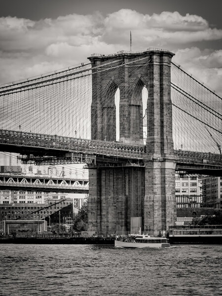 Black and white image of the Brooklyn Bridge in New York City