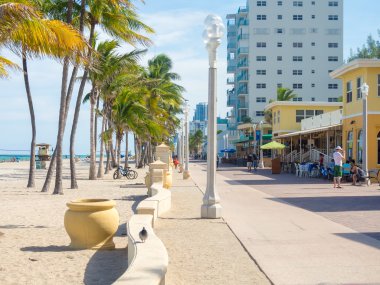 The famous Hollywood Beach boardwalk in Florida clipart