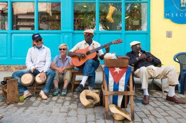 Senior cuban men playing traditional music in Havana clipart