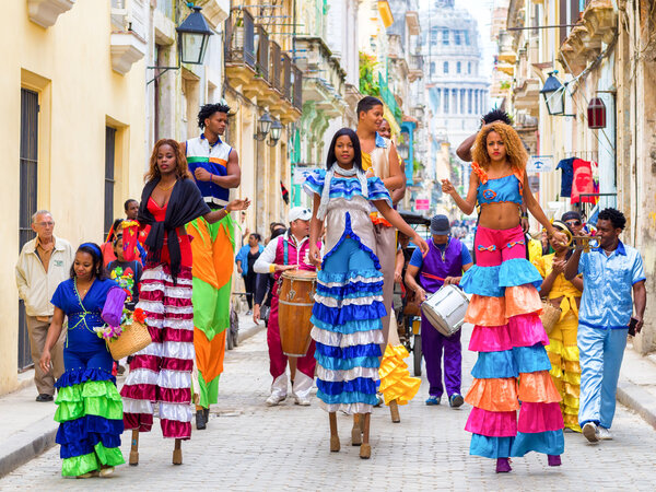 Musicians and dancers on stilts in Old Havana