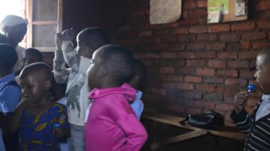 19 Aralık 2020 'de Lilongwe, Malawi' de Nanjiri 'de bir anaokulunda kimliği belirsiz çocuklar.