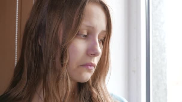 Depressed girl at home. Sad girl near window. 4K UHD. — Stock Footage Depressed girl at home. Sad girl near window. 4K UHD. Video Clip