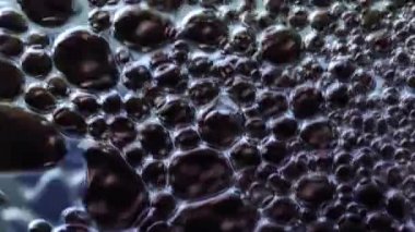 Makro closeup su ya da petrol, arka plan bir öğe. 4k Uhd.