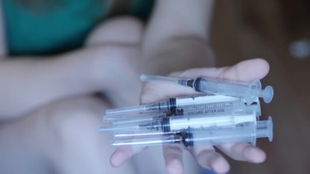 People, woman, drug addiction. Closeup of a hand with s syringe, 4K UHD. — Stock Video