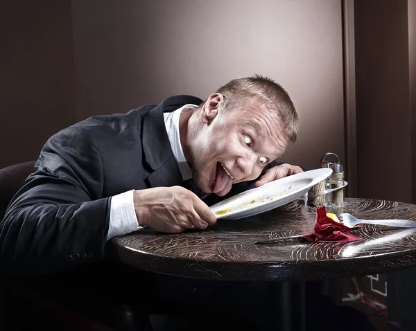 Hombre de negocios musculoso comiendo — Foto de Stock