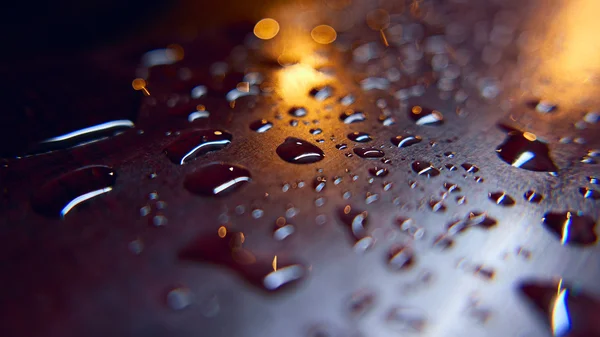 A chuva cai em uma superfície. Contexto abstrato . — Fotografia de Stock