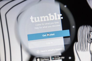 Tumblr website under a magnifying glass clipart