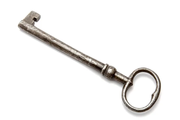 Παλιό κλειδί σε λευκό φόντο — Φωτογραφία Αρχείου