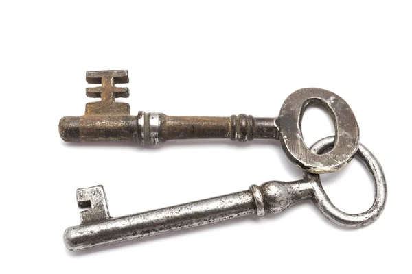 Old keys on white background — Stock Photo, Image