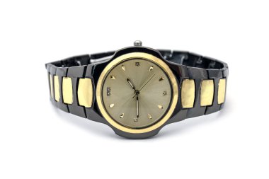 Golden wristwatch on white background