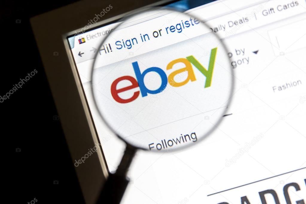 Ostersund, Sweden - October 24, 2015: Closeup of ebay website under a magnifying glass. eBay is an american multinational corporation and e-commerce company