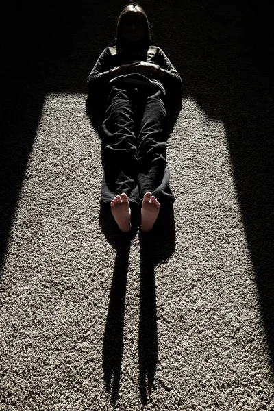 Shadow of Person Lying on Floow with Sunlight legs feet