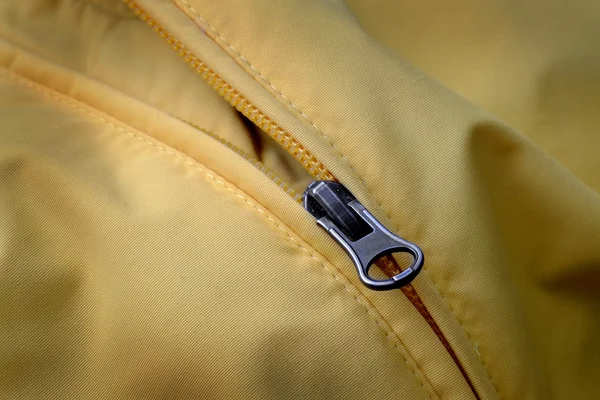 Zipper em casaco amarelo com textura — Fotografia de Stock