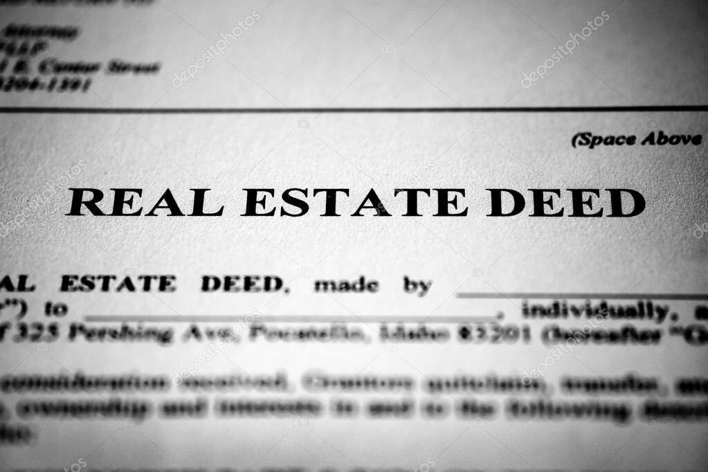 Real estate deed to transfer ownership of land or property