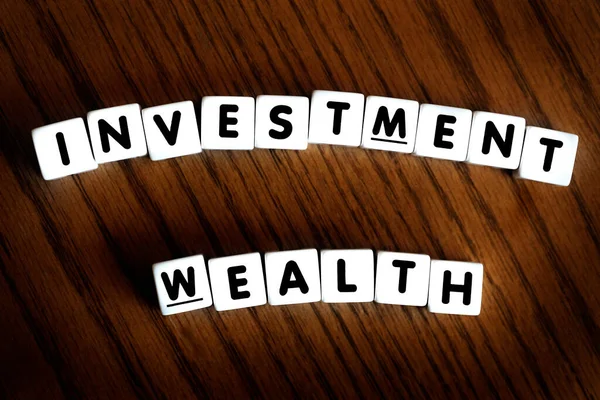 Investment Wealth Spelled Letters Blocks Dice Representing Savings Planning Future — Stock Photo, Image