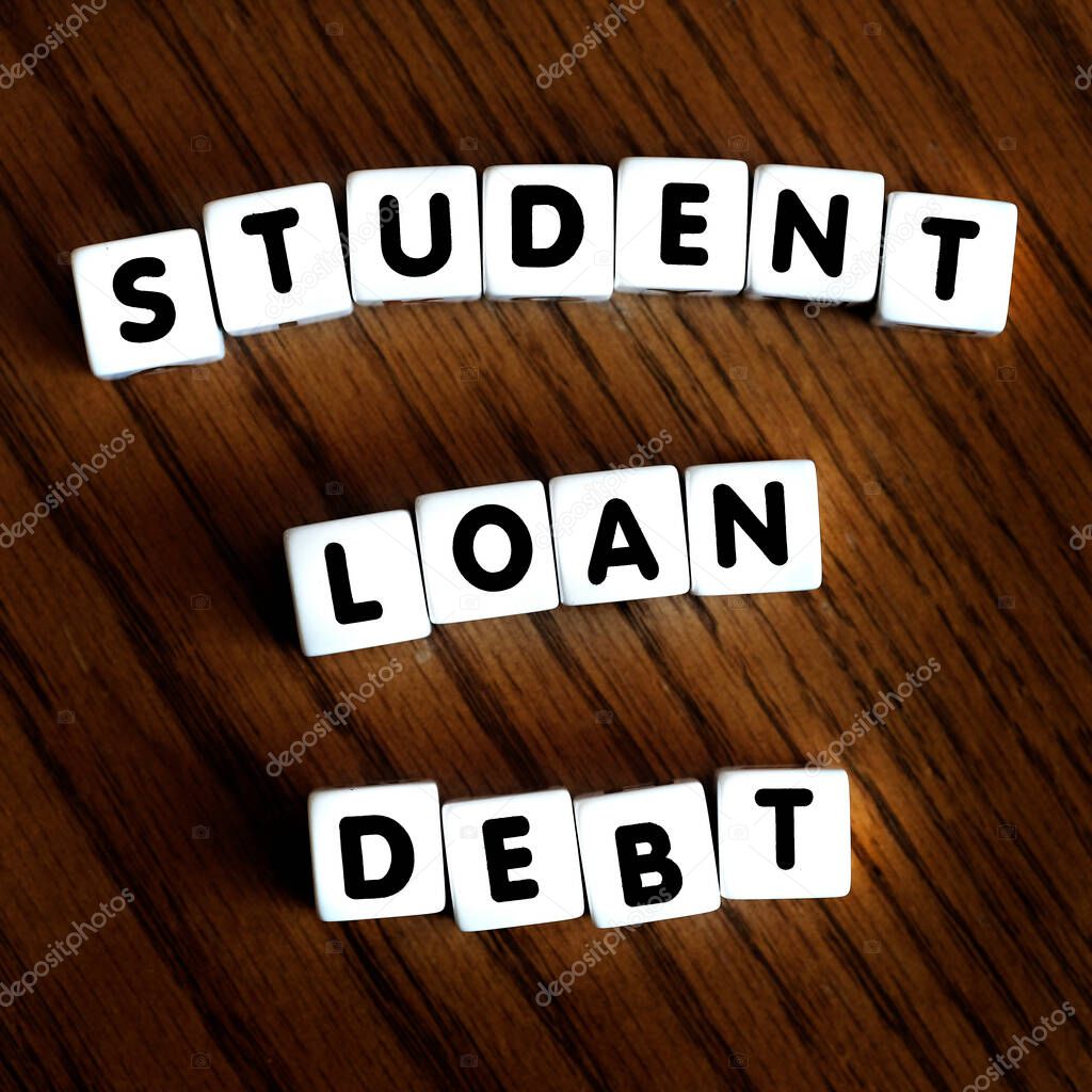 Student loan debt words letters on block dice representing massive payments and financial stress