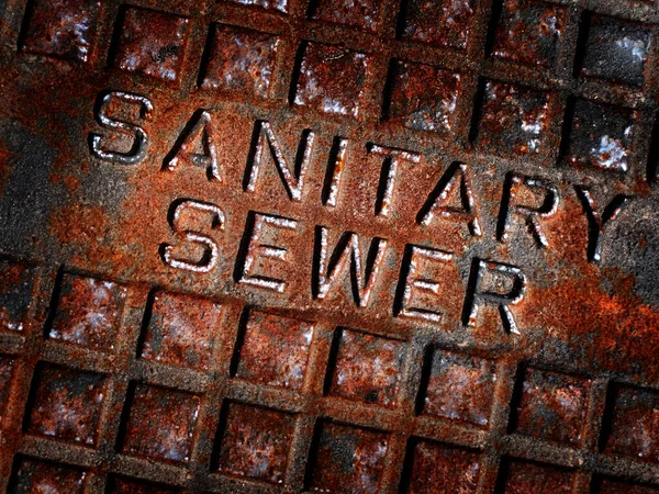 Kanalizacja Człowiek Otwór Pokrywa Sanitarne Żelaza Miejsce Teksturowane Zardzewiałe — Zdjęcie stockowe