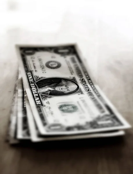 お金の現金ドル紙幣アメリカの富富と貯蓄豊富な選択的フォーカスのぼかし — ストック写真