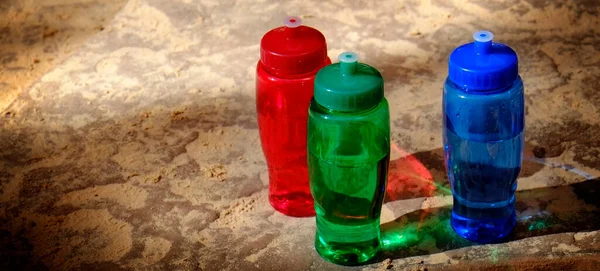 Detailed Red Green Blue Bottles Rought Rocks — Stock Photo, Image