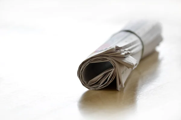 Rolled Up Periódico Papel de noticias — Foto de Stock