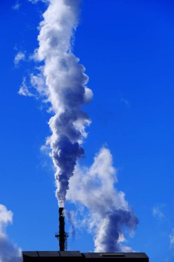 Çevre için tehlikeli emisyonlara kirlilik ve kirlilik saçan Fabrika veya Enerji Santralinin Detayları gezegende potansiyel olarak sağlık riskleri ve zararlı iklim