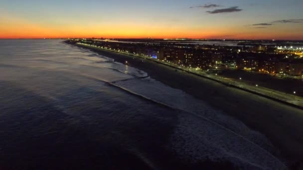Luchtfoto beeldmateriaal Long Beach Ny's nachts — Stockvideo