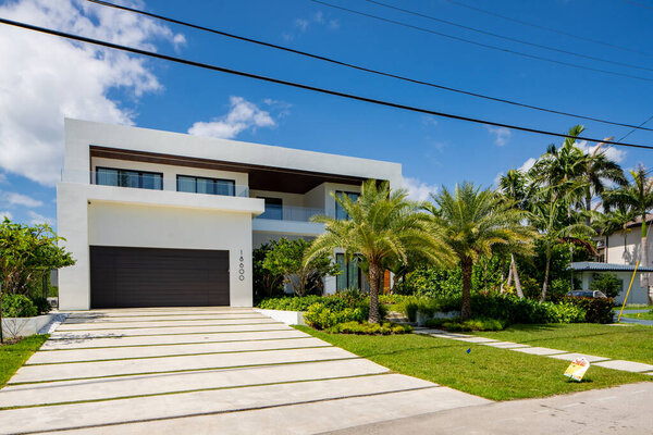 SUNNY ISLES BEACH, FL, USA - APRIL 28, 2021: Photo series of residential houses in Golden Shores a neighborhood in the City of Sunny Isles Beach a subdivision of Miami Dade County