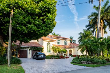 Fort Lauderdale, FL, USA - May 1, 2021: Photo of a single family home in Las Olas Isles neighborhood which is a waterfront upscale subdivision of Broward Dade County clipart
