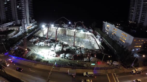 Sitio de construcción de noche aérea — Vídeos de Stock