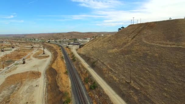 Aerial video of railroad and oil fields — Stock Video