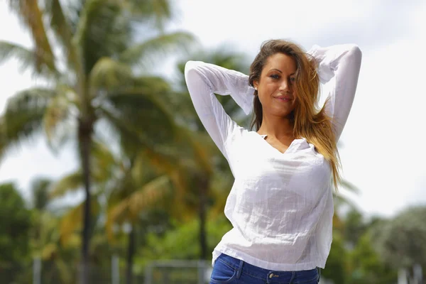 Woman stretching her arms — Stock Photo, Image