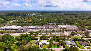Miami, FL, USA - October 7, 2025: Residential neighborhoods in Pinecrest Florida. Aerial view of shopping centers and single family homes