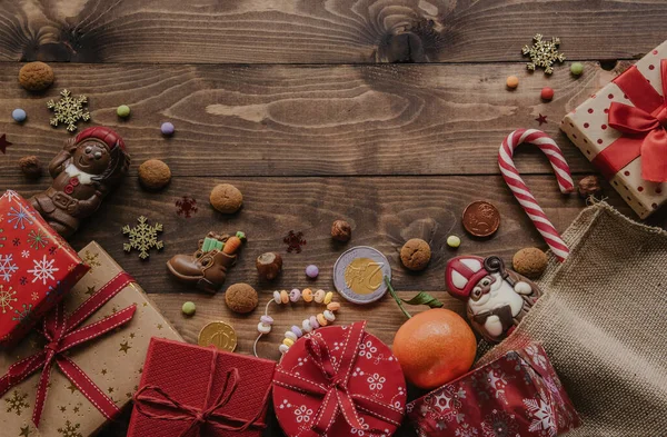 Saint Nicholas Chocolate Gifts Wooden Background — Stock Photo, Image