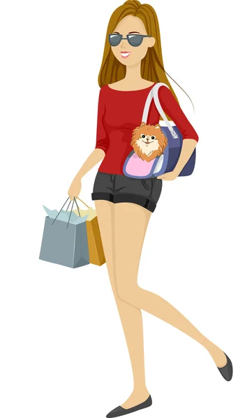 買い物に遊ぶ犬を取っている女の子 — ストック写真