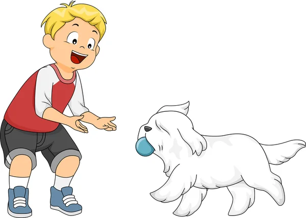 Мальчик, играющий с собакой — стоковое фото