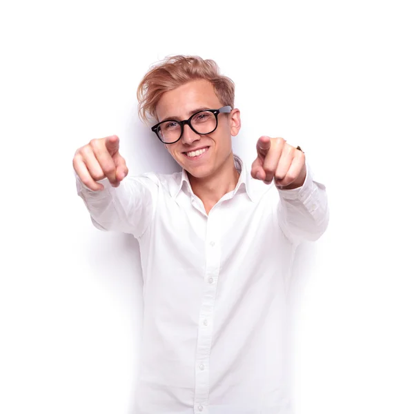 Young sexy blonde man pointing fingers at the camera — Stockfoto