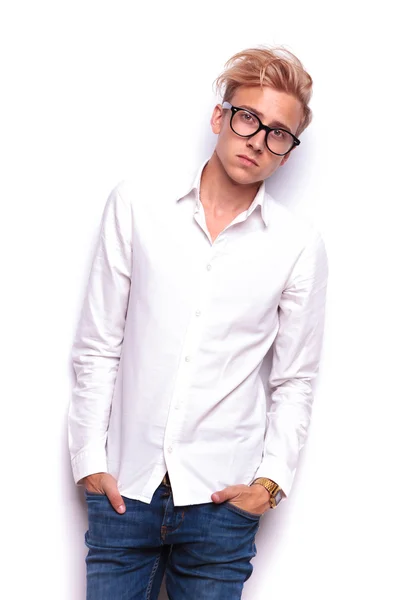 Young handsome blonde man posing with hands in pockets — 图库照片