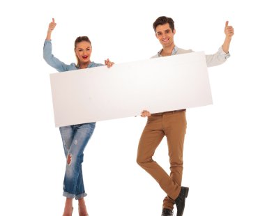 attractive couple posing with legs crossed