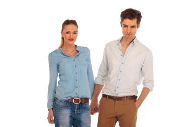 beautiful couple posing in white isolated studio