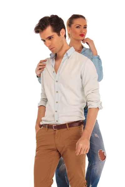 Man posing while woman is touching him — Stock Fotó