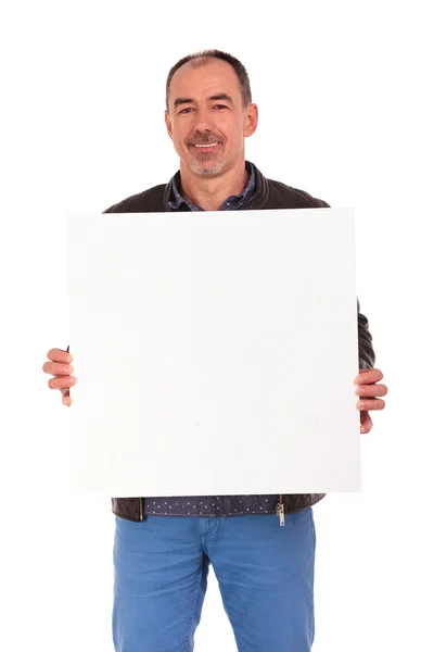 Senior man holding a white board — Stock Photo, Image